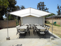 carpa 10 x 30 con mesas y sillas